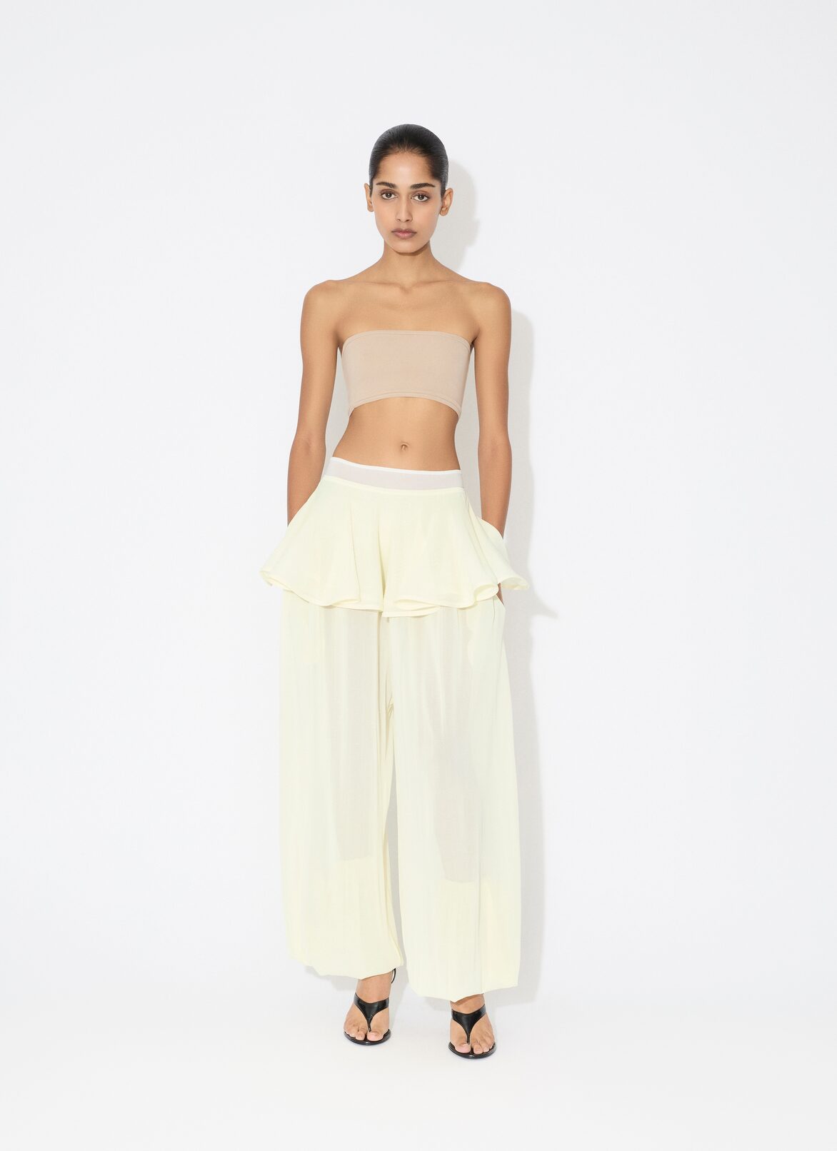 KNIT PEPLUM PANTS ALAÏA YELLOW KNIT PEPLUM PANTS